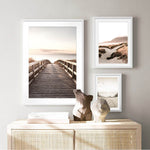 Load image into Gallery viewer, Three scandinavian beach nature landscape wall art prints hanging above a table
