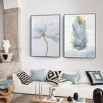 Load image into Gallery viewer, Abstract scandinavian blue flower and feather wall art prints hanging above a sofa
