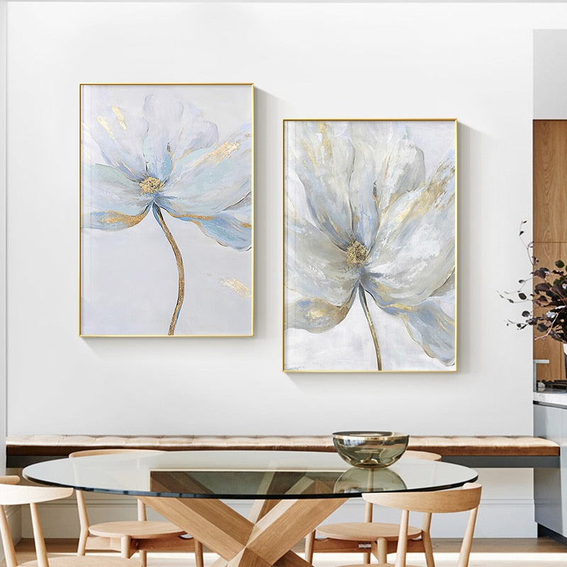 Abstract scandinavian blue and grey flower wall art prints hanging above a glass table