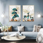 Load image into Gallery viewer, Green gold and bronze leaf and deer wall art print hanging above grey sofa and table.
