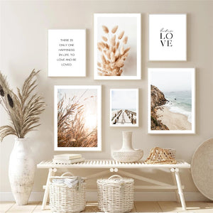 Collection of scandinavian nature wall art prints hanging above a table
